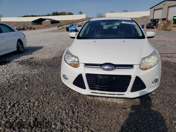 2012 Ford Focus SE with VIN 1FAHP3F27CL182474, listed as a Copart auction lot 51451595 with 122,199 mi miles and Salvage Title. Bid and sale history available at DreamBid. Image 5.