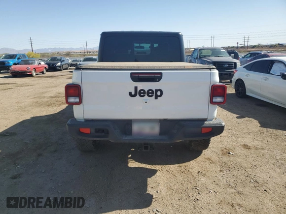 2023 Jeep Gladiator Freedom с VIN 1C6JJTAGXPL538896, выставлен на аукционе Copart как лот 50427195 с пробегом Не указан миль и Списание • Salvage title. История ставок и продаж доступна на DreamBid. Изображение 6.