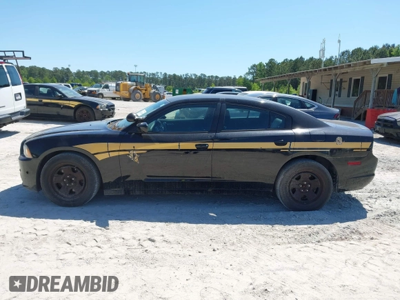 2014 Dodge Charger Police with VIN 2C3CDXAT1EH367015, listed as a IAAI auction lot 42136195 with 121,536 mi miles and . Bid and sale history available at DreamBid. Image 14.