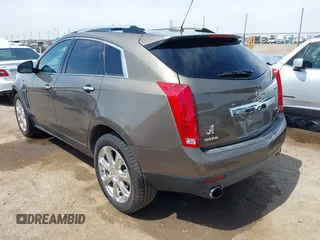 2016 Cadillac SRX Performance Collection z VIN 3GYFNCE39GS512286, wystawiony jako IAAI lot #42392467 z przebiegiem 95 708 mil mil oraz . Historia ofert i sprzedaży dostępna na DreamBid. Obrazek 3.