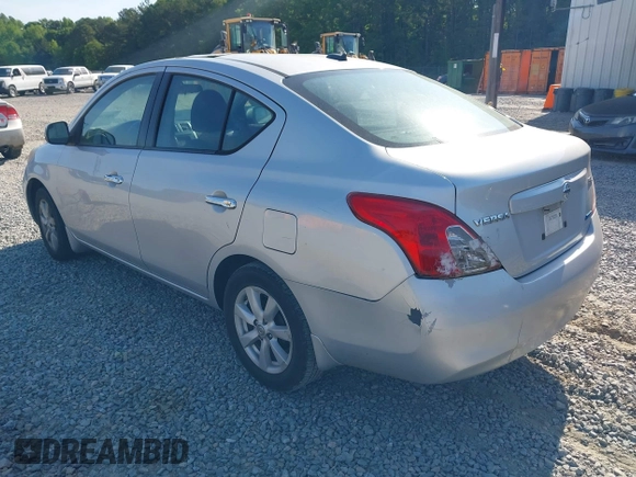 2012 Nissan Versa SV with VIN 3N1CN7APXCL867337, listed as a IAAI auction lot 42079349 with 260,442 mi miles. Bid and sale history available at carsss.com. Image 3.