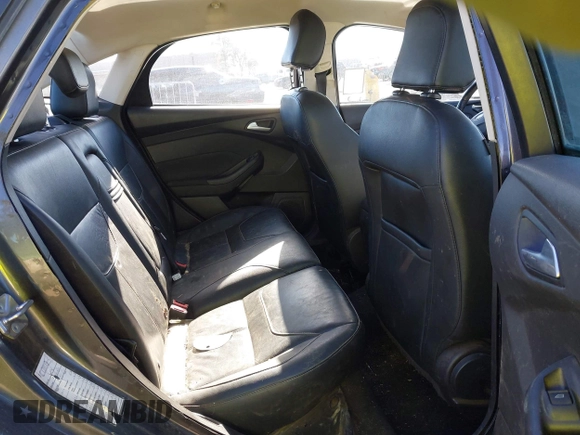 2016 Ford Focus SE z VIN 1FADP3F27GL321507, wystawiony jako IAAI lot #41278203 z przebiegiem 157 910 mil mil oraz . Historia ofert i sprzedaży dostępna na DreamBid. Obrazek 8.