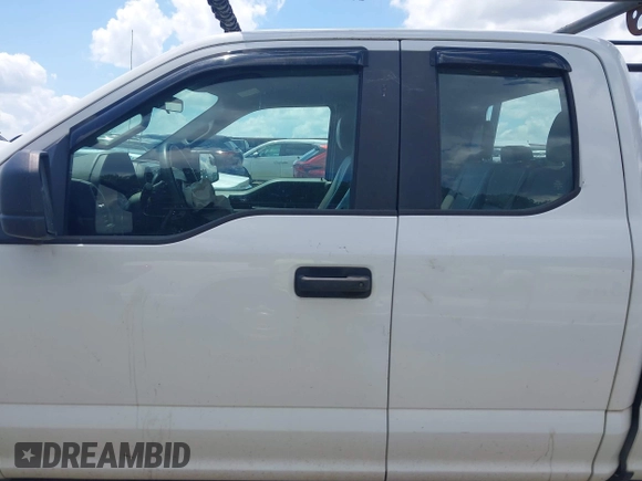 2018 Ford F-150 XL with VIN 1FTEX1CB5JFE55932, listed as a IAAI auction lot 42298917 with 143,923 mi miles and . Bid and sale history available at DreamBid. Image 14.