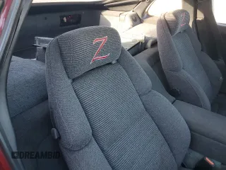 1990 Nissan 300ZX z VIN JN1RZ24A7LX006503, wystawiony jako Copart lot #77695394 z przebiegiem 155 546 mil mil oraz Szkody całkowita. Historia ofert i sprzedaży dostępna na DreamBid. Obrazek 10.