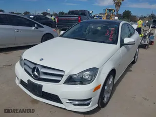 2012 Mercedes-Benz C-Class C 250 with VIN WDDGJ4HB0CF808400, listed as a IAAI auction lot 41599978 with 61,326 mi miles. Bid and sale history available at carsss.com. Image 2.
