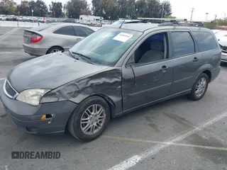 2005 Ford Focus SE with VIN 1FAFP36N65W305152, listed as a IAAI auction lot 42064504 with 280,811 mi miles and . Bid and sale history available at carsss.com. Image 2.