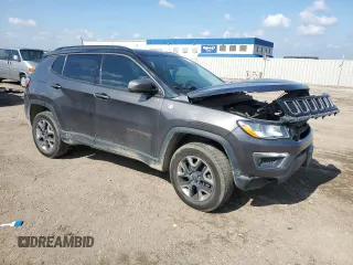 2018 Jeep Compass Trailhawk with VIN 3C4NJDDB0JT458339, listed as a Copart auction lot 58834155 with 103,811 mi miles and Salvage title. Bid and sale history available at DreamBid. Image 4.