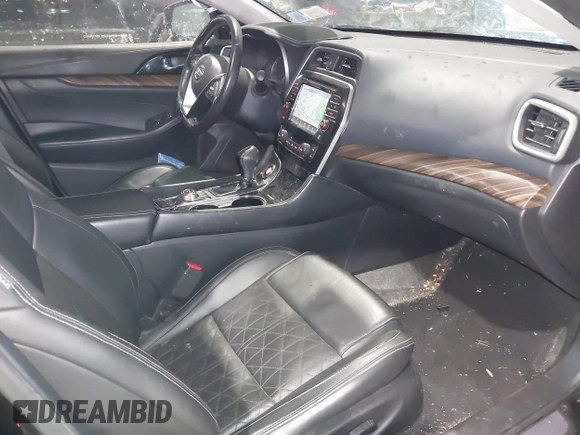 2017 Nissan Maxima SV with VIN 1N4AA6AP6HC451921, listed as a IAAI auction lot 41384995 with 74,160 mi miles and . Bid and sale history available at DreamBid. Image 5.