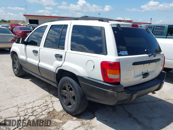 2004 Jeep Grand Cherokee Laredo z VIN 1J4GX48S74C152542, wystawiony jako IAAI lot #42350507 z przebiegiem 176 366 mil mil oraz . Historia ofert i sprzedaży dostępna na DreamBid. Obrazek 3.