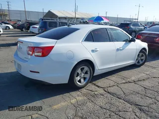 2014 Chevrolet Malibu LS with VIN 1G11A5SL0EF265309, listed as a IAAI auction lot 41998283 with 128,999 mi miles and . Bid and sale history available at DreamBid. Image 4.