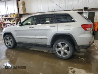 2013 Jeep Grand Cherokee Overland with VIN 1C4RJFCG2DC622345, listed as a Copart auction lot 49640325 with 192,144 mi miles and Salvage Title. Bid and sale history available at carsss.com. Image 2.