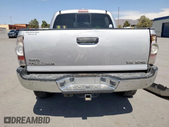2010 Toyota Tacoma with VIN 3TMLU4EN7AM049157, listed as a Copart auction lot 60904045 with 304,200 mi miles and Clean title. Bid and sale history available at DreamBid. Image 6.