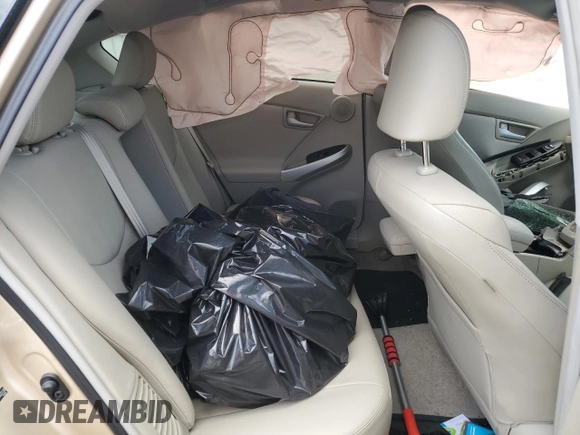 2011 Toyota Prius I z VIN JTDKN3DUXB0322138, wystawiony jako Copart lot #58489395 z przebiegiem Nie podano mil oraz Szkoda całkowita • Salvage title. Historia ofert i sprzedaży dostępna na DreamBid. Obrazek 10.