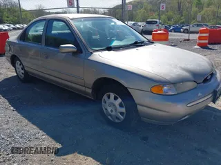 1995 Ford Contour LX with VIN 1FALP6530SK102135, listed as a IAAI auction lot 42103390 with 108,513 mi miles and . Bid and sale history available at DreamBid. Image 1.