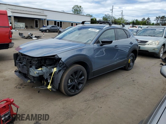 2022 Mazda CX-30 S Carbon Edition with VIN 3MVDMBCL7NM408036, listed as a Copart auction lot 56683665 with 82,337 mi miles and Salvage title. Bid and sale history available at DreamBid. Image 1.