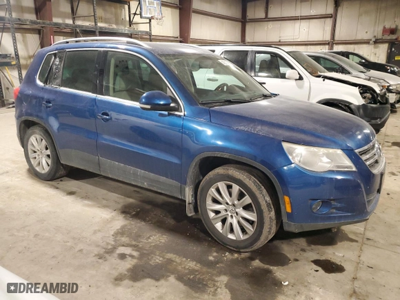 2009 Volkswagen Tiguan S with VIN WVGAV75N99W001723, listed as a Copart auction lot 43312365 with 193,171 mi miles and Salvage Title. Bid and sale history available at carsss.com. Image 4.