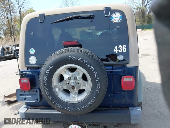 2000 Jeep Wrangler Sport with VIN 1J4FA49S5YP750123, listed as a IAAI auction lot 42060009 with Not Provided miles. Bid and sale history available at carsss.com. Image 16.
