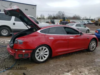 2017 Tesla Model S 100D with VIN 5YJSA1E29HF184387, listed as a Copart auction lot 39186144 with 101,387 mi miles and Salvage title. Bid and sale history available at DreamBid. Image 3.