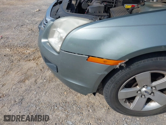 2006 Ford Fusion SE with VIN 3FAFP07ZX6R236583, listed as a IAAI auction lot 41798474 with 173,399 mi miles and . Bid and sale history available at DreamBid. Image 13.
