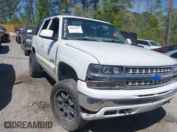 2003 Chevrolet Tahoe LS with VIN 1GNEK13Z13J131945, listed as a IAAI auction lot 42036677 with Not Provided miles. Bid and sale history available at carsss.com. Image 1.