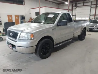 2005 Ford F-150 XL with VIN 1FTRF12W15NA18935, listed as a IAAI auction lot 41942570 with 152,708 mi miles. Bid and sale history available at carsss.com. Image 2.