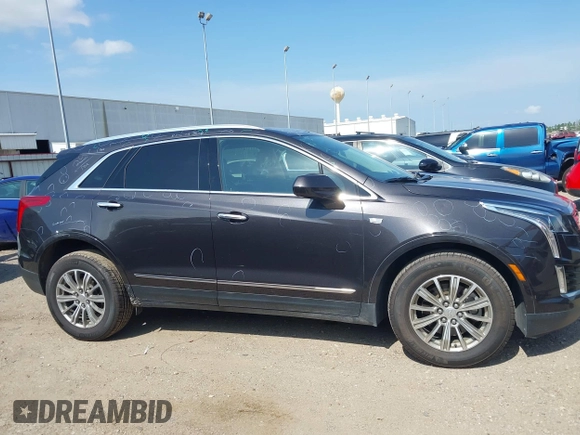 2018 Cadillac XT5 Luxury AWD z VIN 1GYKNDRS0JZ209266, wystawiony jako IAAI lot #42454536 z przebiegiem 52 839 mil mil oraz . Historia ofert i sprzedaży dostępna na DreamBid. Obrazek 13.