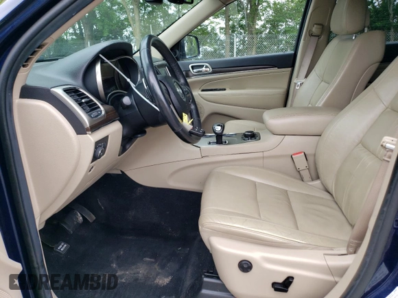2014 Jeep Grand Cherokee Limited with VIN 1C4RJFBG4EC355034, listed as a Copart auction lot 60977425 with 102,852 mi miles and Salvage title. Bid and sale history available at DreamBid. Image 7.