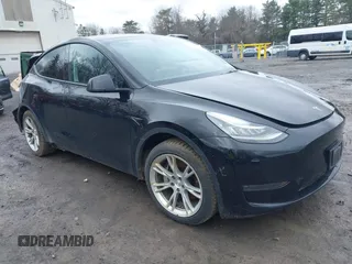 2022 Tesla Model Y Long Range with VIN 7SAYGDEE5NA016892, listed as a IAAI auction lot 41936735 with 69,136 mi miles and . Bid and sale history available at carsss.com. Image 1.