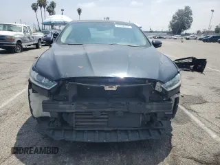 2013 Ford Fusion SE z VIN 3FA6P0H97DR215735, wystawiony jako Copart lot #62326335 z przebiegiem 100 312 mil mil oraz Szkoda całkowita • Salvage title. Historia ofert i sprzedaży dostępna na DreamBid. Obrazek 5.