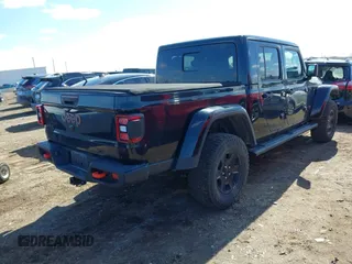 2021 Jeep Gladiator Mojave with VIN 1C6JJTEG9ML528964, listed as a IAAI auction lot 41879113 with 74,315 mi miles and . Bid and sale history available at DreamBid. Image 4.