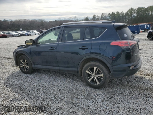 2018 Toyota RAV4 XLE with VIN JTMWFREV6JJ735000, listed as a Copart auction lot 45869275 with 113,675 mi miles and Salvage Title. Bid and sale history available at DreamBid. Image 2.