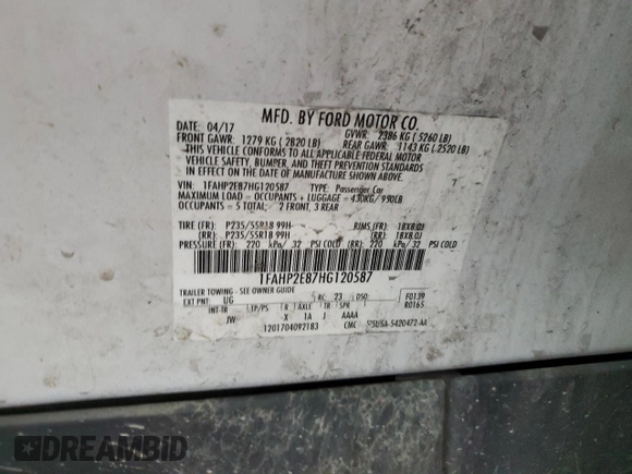 2017 Ford Taurus SEL z VIN 1FAHP2E87HG120587, wystawiony jako Copart lot #52598435 z przebiegiem 88 270 mil mil oraz Szkoda całkowita • Salvage title. Historia ofert i sprzedaży dostępna na DreamBid. Obrazek 12.