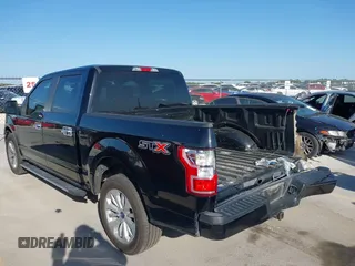 2018 Ford F-150 XL with VIN 1FTEW1C58JKC02382, listed as a IAAI auction lot 42010568 with 124,757 mi miles and . Bid and sale history available at DreamBid. Image 3.