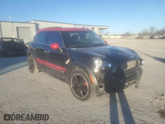 2015 MINI Countryman John Cooper Works with VIN WMWXD1C5XFWS34732, listed as a Copart auction lot 42402185 with Not Provided miles and Salvage Title. Bid and sale history available at DreamBid. Image 4.