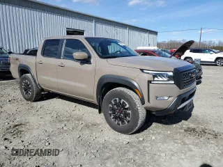 2024 Nissan Frontier Pro-4X with VIN 1N6ED1EK2RN656885, listed as a Copart auction lot 46604165 with 4,390 mi miles and Salvage title. Bid and sale history available at DreamBid. Image 4.