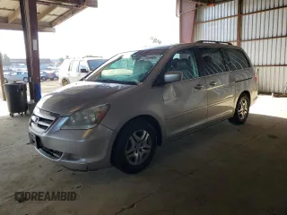 2006 Honda Odyssey EX-L z VIN 5FNRL38736B441584, wystawiony jako Copart lot #57306805 z przebiegiem 187 343 mil mil oraz Szkoda całkowita • Salvage title. Historia ofert i sprzedaży dostępna na DreamBid. Obrazek 1.