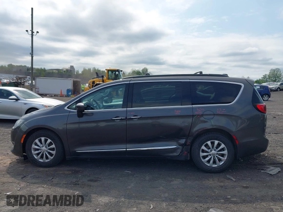 2017 Chrysler Pacifica Touring L with VIN 2C4RC1BG5HR705277, listed as a IAAI auction lot 42230036 with 75,287 mi miles and . Bid and sale history available at DreamBid. Image 14.