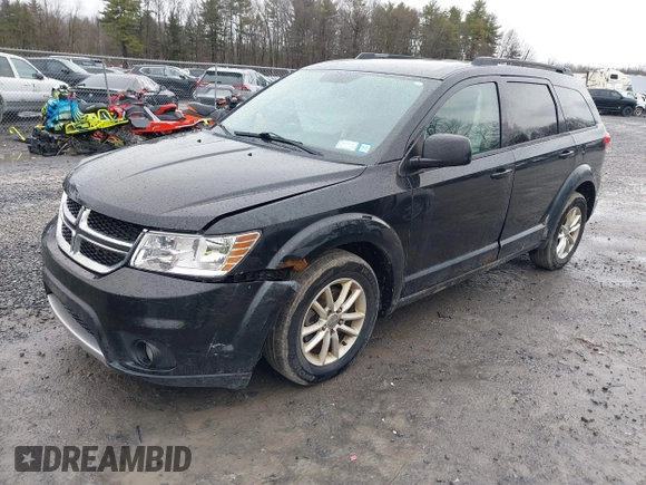 2013 Dodge Journey SXT with VIN 3C4PDDBG2DT507690, listed as a IAAI auction lot 41793988 with 211,110 mi miles and . Bid and sale history available at DreamBid. Image 2.