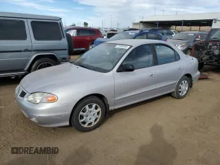 1999 Hyundai Elantra z VIN KMHJF25F8XU852123, wystawiony jako Copart lot #72284584 z przebiegiem 12 750 mil mil oraz Czysty tytuł • Clean title. Historia ofert i sprzedaży dostępna na DreamBid. Obrazek 1.