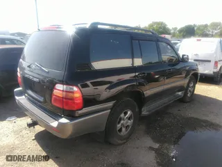 2001 Toyota Land Cruiser with VIN JTEHT05J512016563, listed as a IAAI auction lot 41868193 with 247,653 mi miles. Bid and sale history available at carsss.com. Image 4.