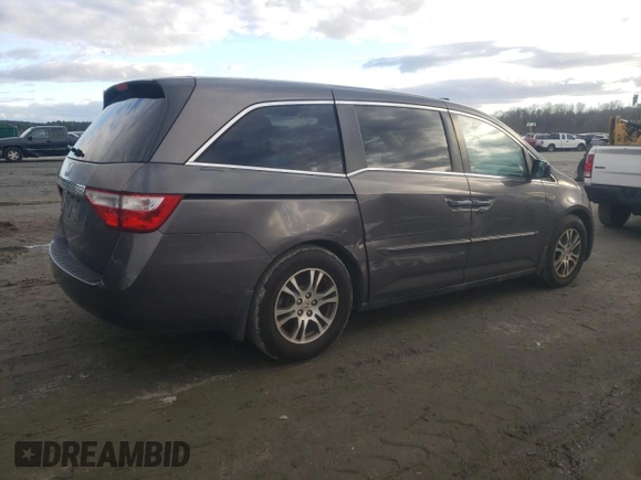 2011 Honda Odyssey EX-L with VIN 5FNRL5H64BB073266, listed as a Copart auction lot 84478964 with 207,991 mi miles and Salvage Title. Bid and sale history available at DreamBid. Image 3.