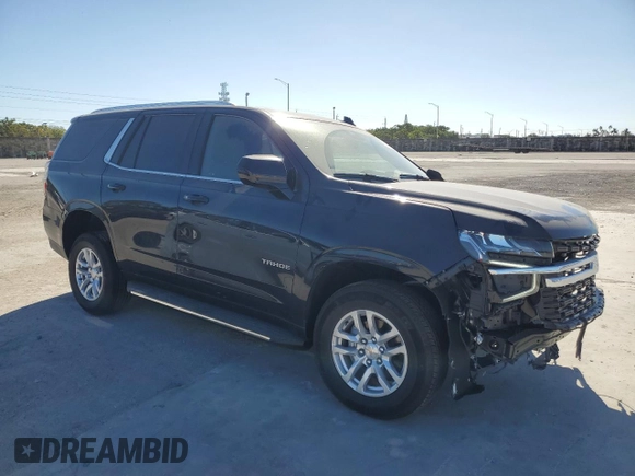 2024 Chevrolet Tahoe LS with VIN 1GNSCMKD3RR213273, listed as a Copart auction lot 82114044 with 1,588 mi miles and Salvage title. Bid and sale history available at DreamBid. Image 4.