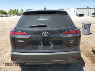 2023 Toyota Corolla Cross XLE с VIN 7MUDAABG9PV076750, выставлен на аукционе Copart как лот 51434765 с пробегом Не указан миль и Списание • Salvage title. История ставок и продаж доступна на DreamBid. Изображение 6.