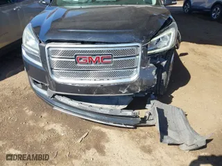 2014 GMC Acadia Denali with VIN 1GKKRTKD0EJ173975, listed as a IAAI auction lot 41615302 with 147,169 mi miles. Bid and sale history available at carsss.com. Image 6.