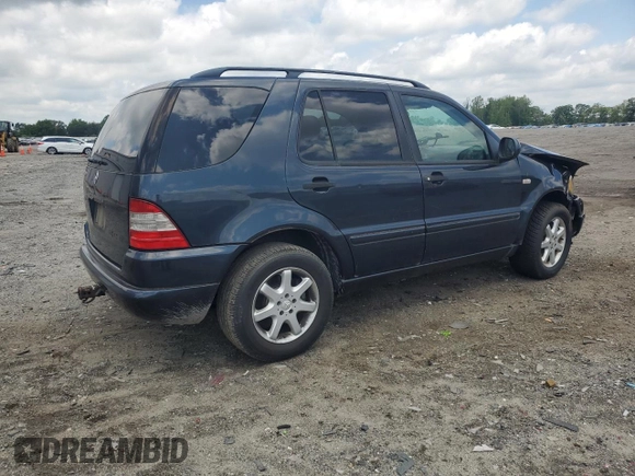 2000 Mercedes-Benz M 320/430/500 with VIN 4JGAB72E7YA168445, listed as a Copart auction lot 59401235 with 231,591 mi miles and Salvage title. Bid and sale history available at DreamBid. Image 3.