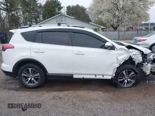 2018 Toyota RAV4 XLE with VIN JTMRFREV9JJ218173, listed as a IAAI auction lot 42037959 with 91,056 mi miles. Bid and sale history available at carsss.com. Image 14.