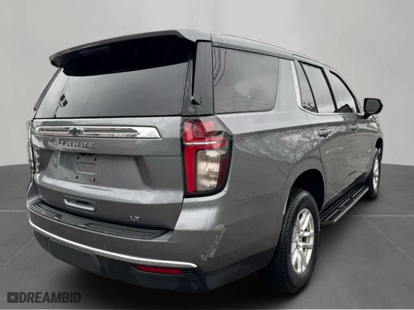 2021 Chevrolet Tahoe LT with VIN 1GNSCNKD6MR216635, listed as a Copart auction lot 52551075 with 164,015 mi miles and Clean Title. Bid and sale history available at carsss.com. Image 4.