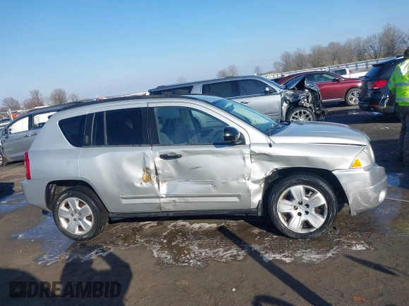 2008 Jeep Compass Sport with VIN 1J8FT47098D665734, listed as a IAAI auction lot 41561801 with 169,446 mi miles. Bid and sale history available at carsss.com. Image 13.