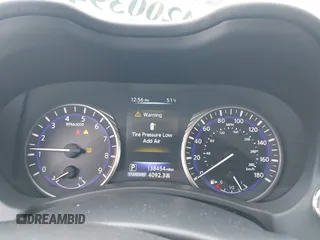 2014 Infiniti Q50 Premium with VIN JN1BV7AP3EM674807, listed as a IAAI auction lot 42003949 with 138,454 mi miles. Bid and sale history available at carsss.com. Image 7.
