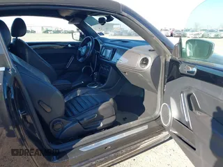 2014 Volkswagen Beetle 1.8T with VIN 3VW517AT4EM815243, listed as a IAAI auction lot 41245346 with 119,259 mi miles and . Bid and sale history available at DreamBid. Image 5.